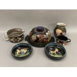 A collection of Swiss folk art pottery comprising, a cheese bell and dish by Daniel Stahli, Kholer