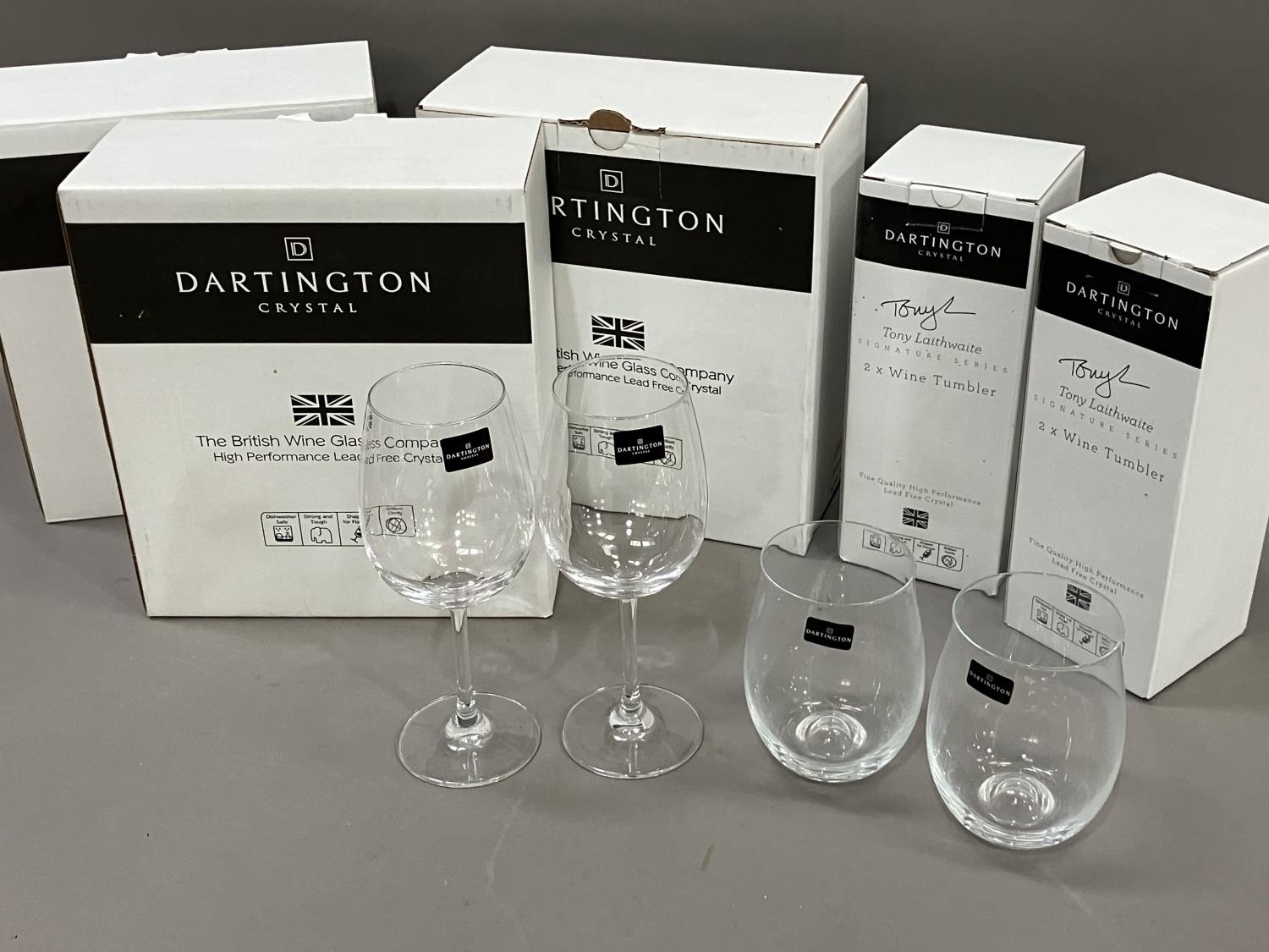 Two sets of Dartington crystal wine tumblers by Tony Laithwaite, and three pairs of Dartington