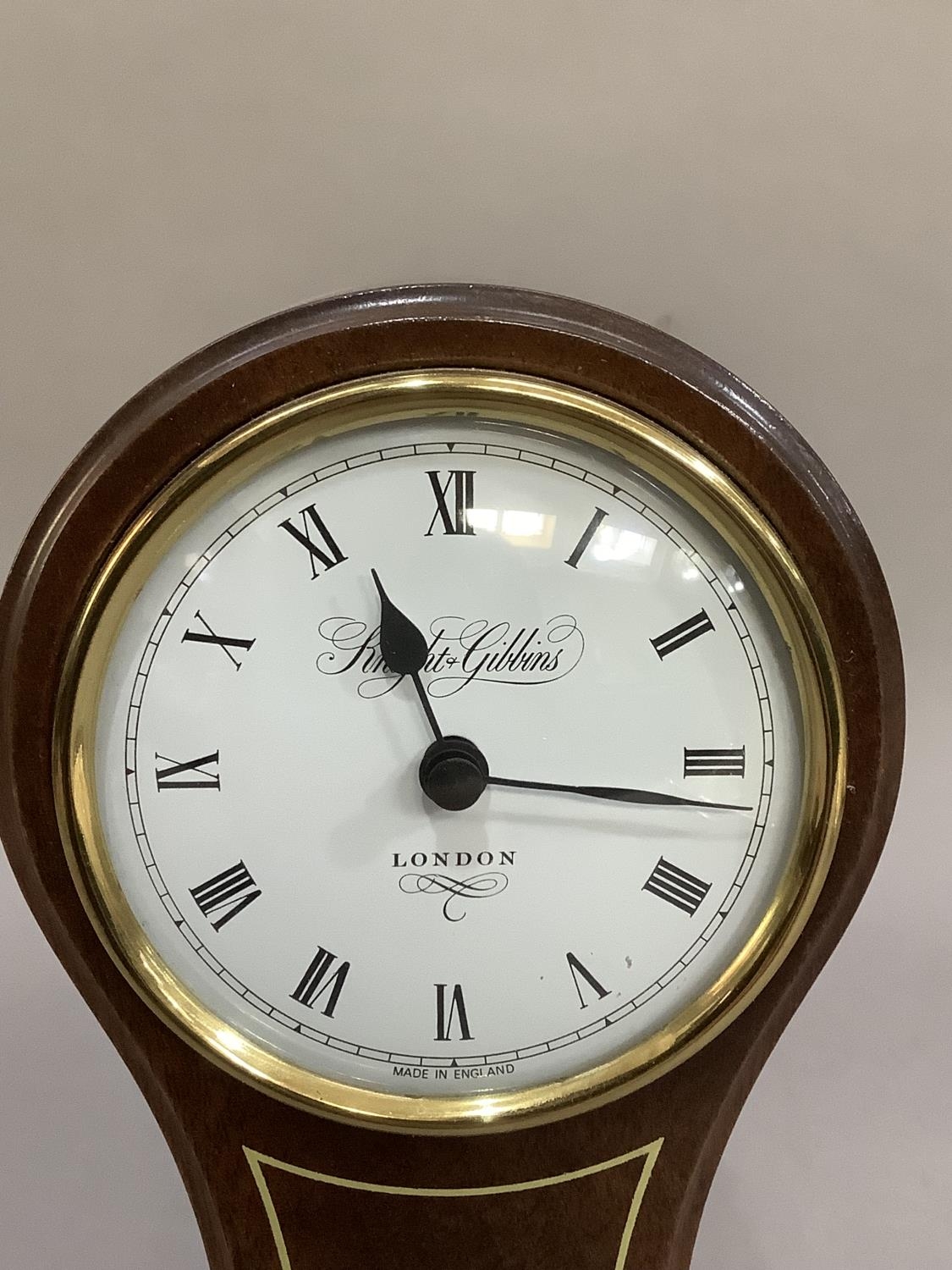 A reproduction, mahogany balloon clock having a white enamelled dial signed Knight and Gibbins, - Image 2 of 4