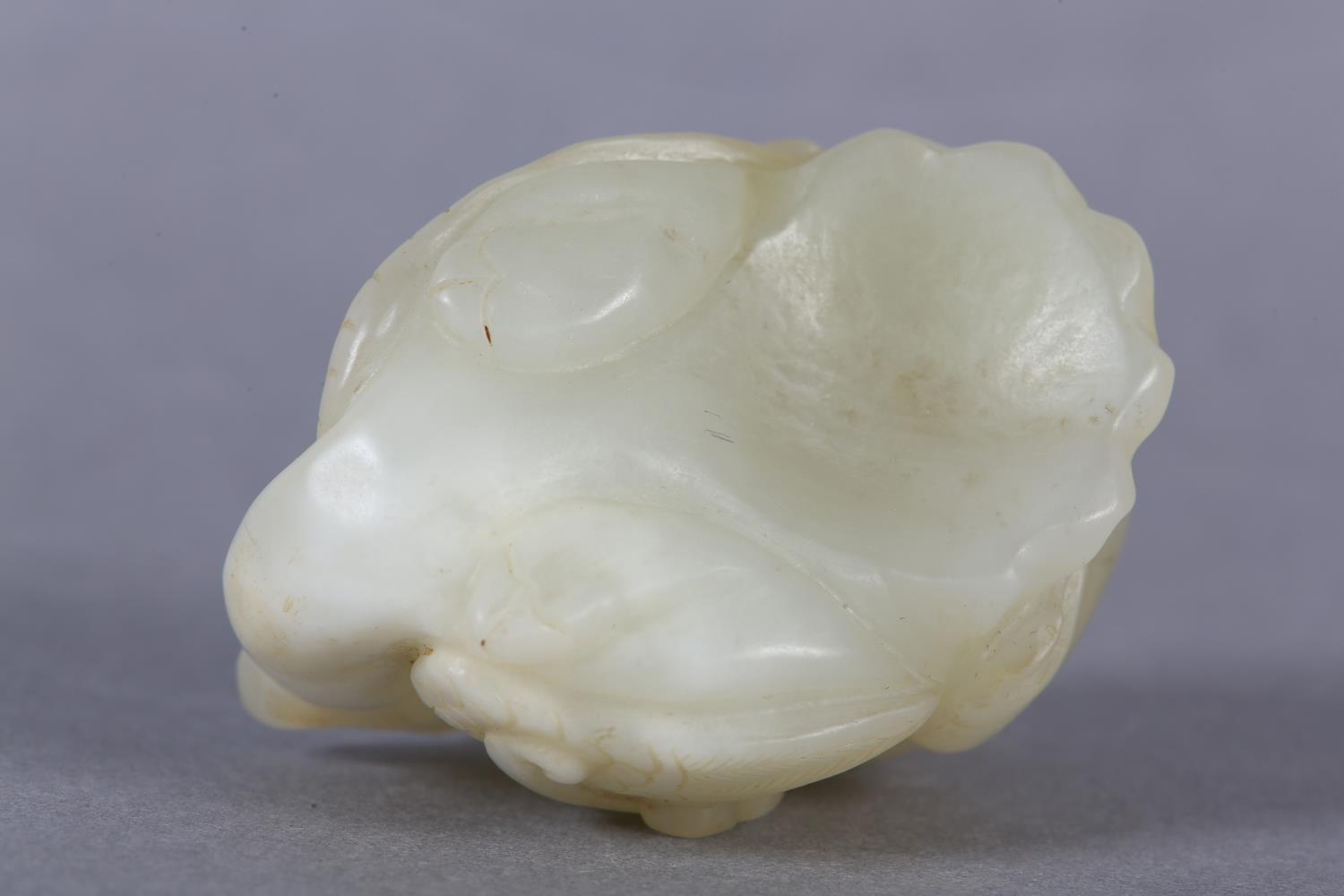 A Chinese jade carving of a boy climbing upon the back of a phoenix with its head turned backwards - Image 8 of 8