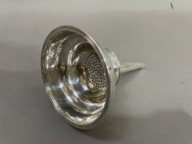 A George III wine funnel London 1792, from AH, plain with banded rim and waist, approx. diameter
