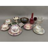 A china cabinet cups and saucers and trios of floral decoration, Grimwade's Royal Winton pedestal