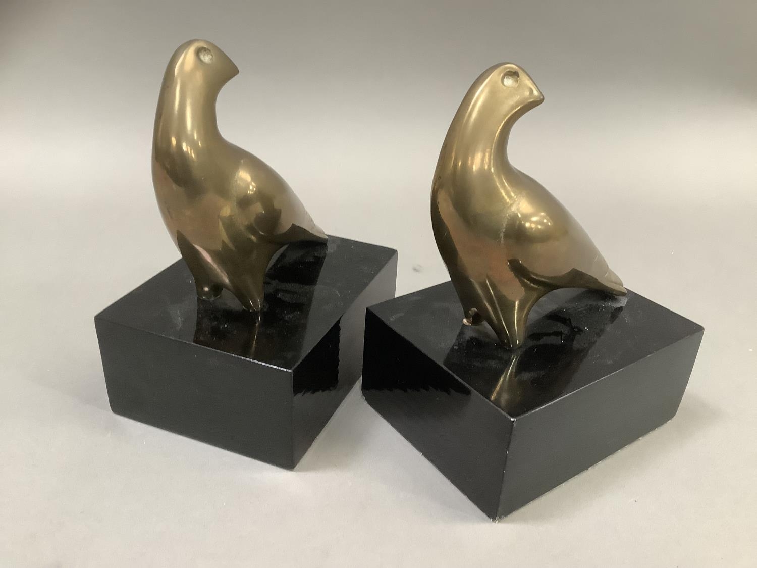 A pair of brass hawk bookends on ebonised, rectangular plinths, 13cm wide x 10cm deep x18cm high - Image 2 of 3