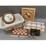 A wicker basket, vintage door handle, wall clock, games box, coat pegs, treen plaque