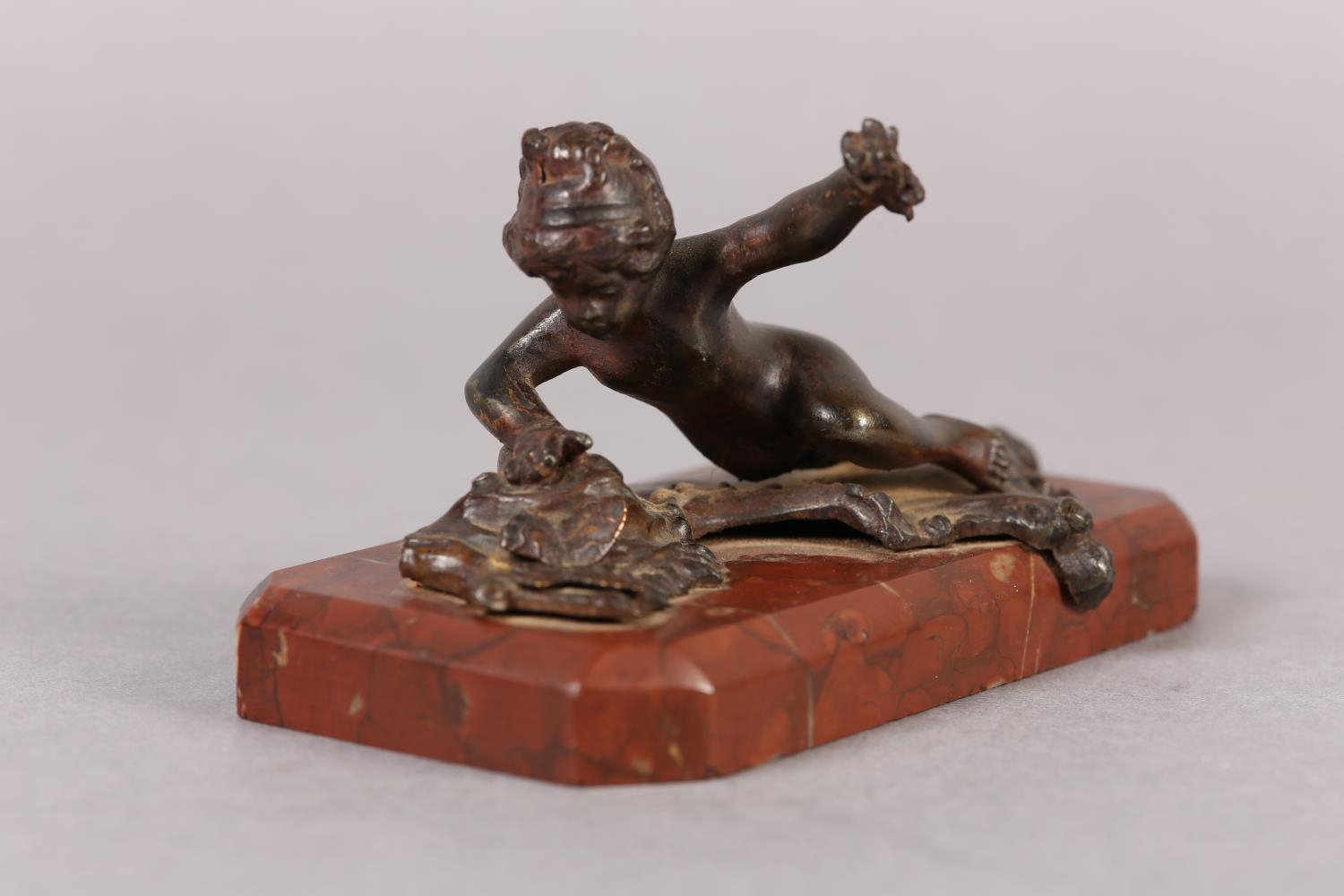 A late 19th century cold painted bronze figure of an infant girl and butterfly, on red marble - Image 2 of 3