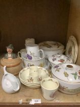 A collection of Royal Worcester Evesham gold tableware comprising three vegetable dishes and covers,