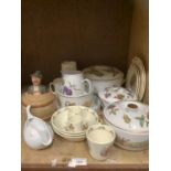 A collection of Royal Worcester Evesham gold tableware comprising three vegetable dishes and covers,