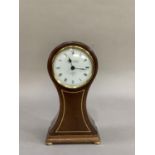 A reproduction, mahogany balloon clock having a white enamelled dial signed Knight and Gibbins,
