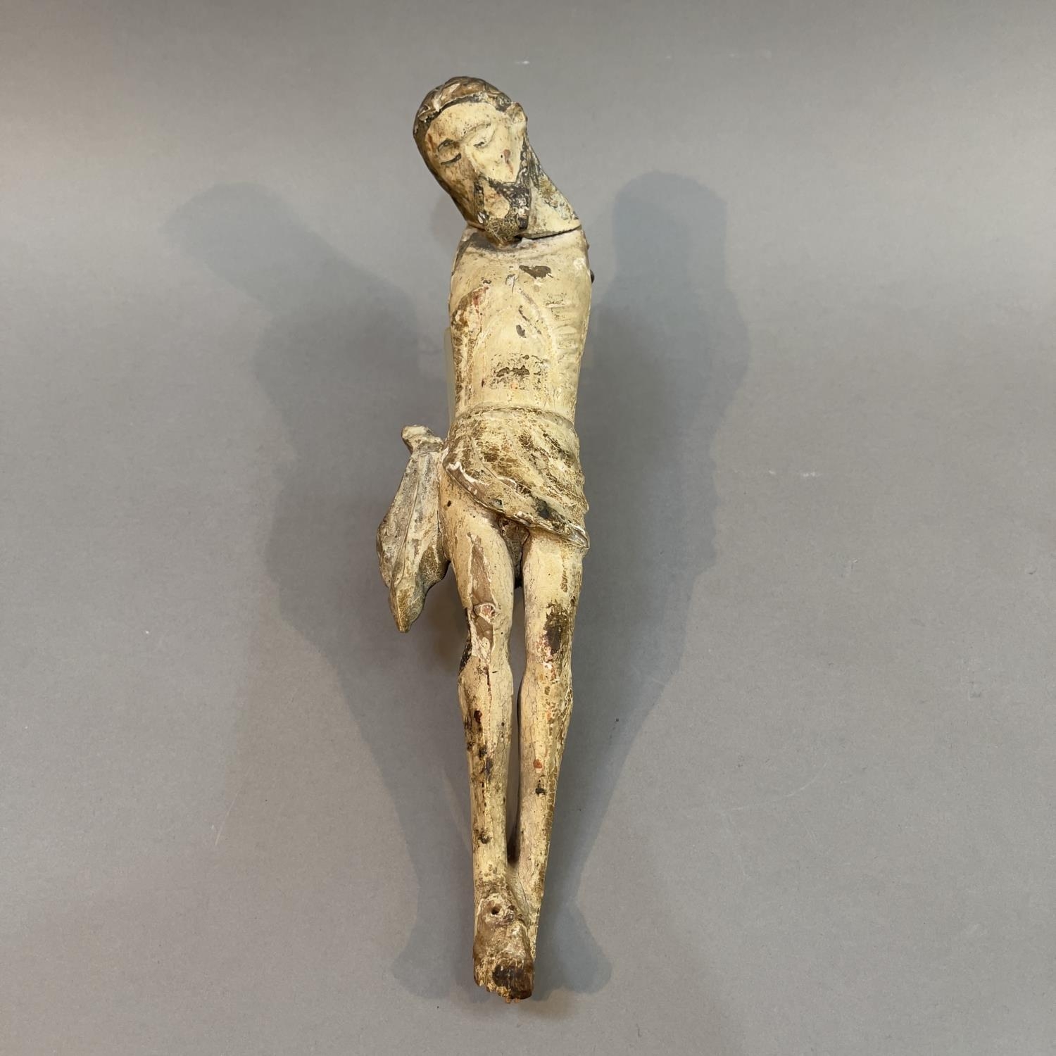 An early polychrome carved body of Christ, in fine grain wood, probably 16th/17th century