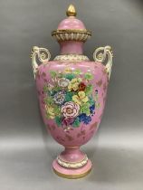 A 19th century vase and cover of baluster form with knop finial, the shoulders with twin moulded