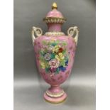 A 19th century vase and cover of baluster form with knop finial, the shoulders with twin moulded