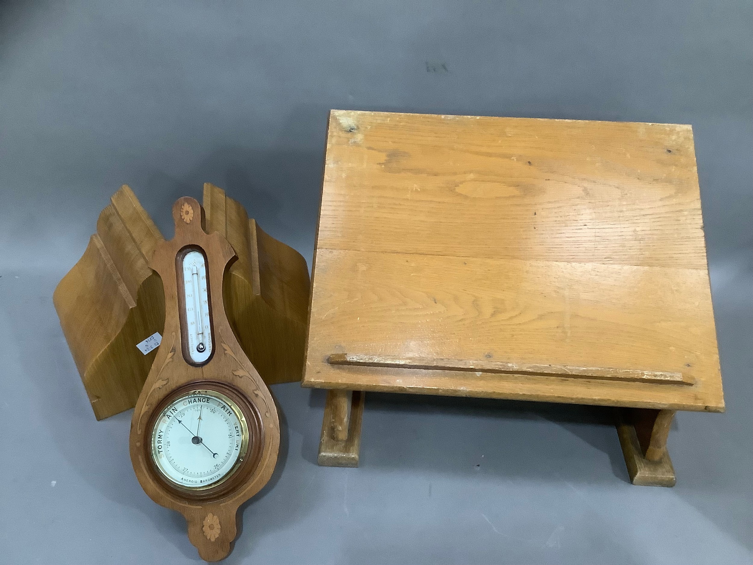 An Edward VII mahogany and satinwood inlaid barometer thermometer together with a pair of pale oak