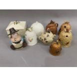 A collection of honey pots in the form of Skeps and other designs including Crown Devon Wedgwood and