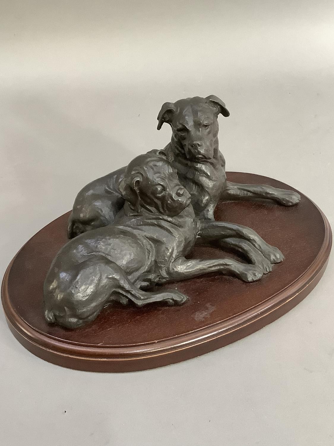 A bronze effect group of two boxer dogs on an oval plinth, 30cm wide x 15cm high - Image 2 of 7