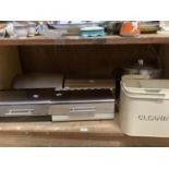 Four metal bread bins together with other kitchenalia