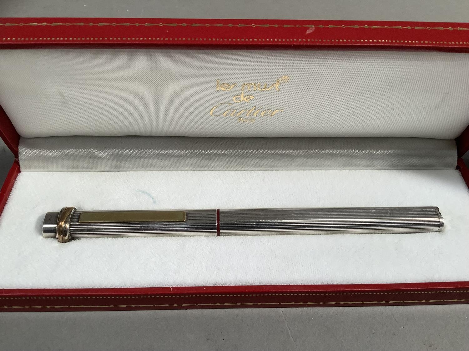A Le Must de Cartier ball point pen with 18ct gold nib, in case with outer sleeve; together with - Image 2 of 3
