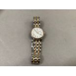 A Tissot lady's 1853 quartz date wristwatch in stainless steel and gilt case No: T825/925 SKL-JA-