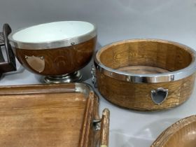 A book trough, twin handle wooden tray, two wooden bowls with plated mounts