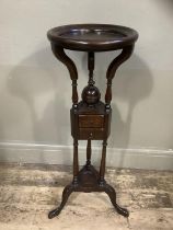 A reproduction mahogany wig stand with two drawers