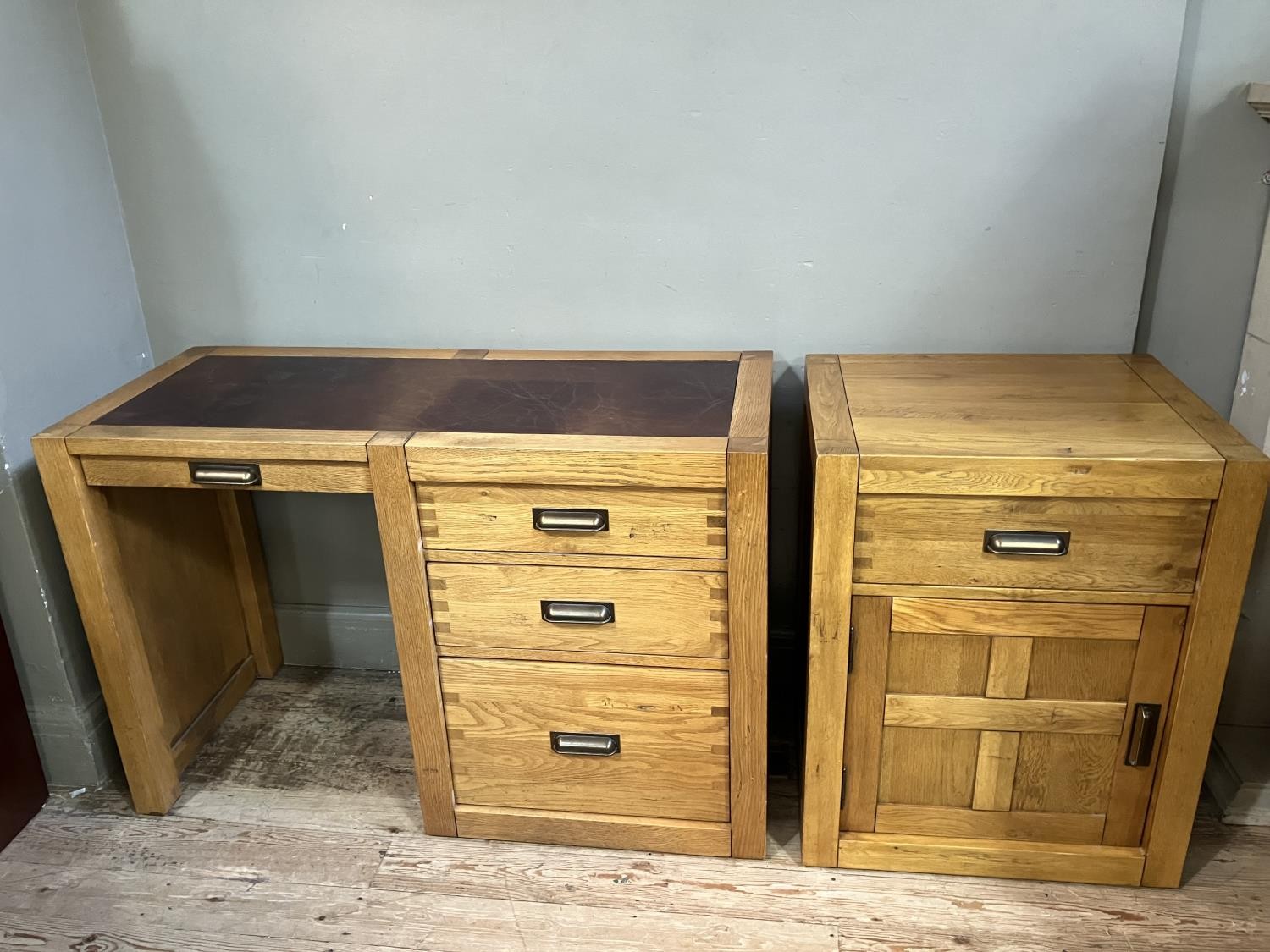 AN elm desk having an incised writing surface with narrow drawer to the kneehole flanked by two - Image 2 of 4