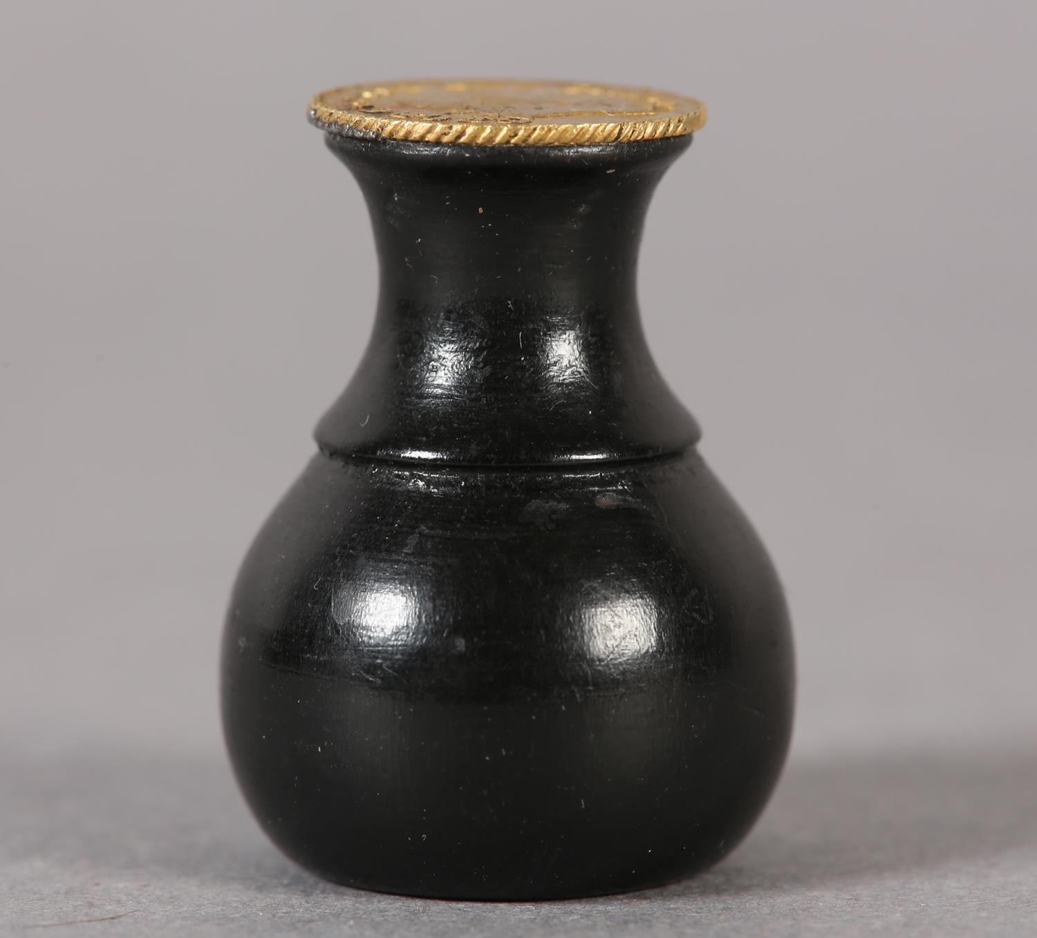 An ebony seal with a George III one-third Guinea Matrix (the coin c1797-1813), 3cm high (Shipping - Image 2 of 4