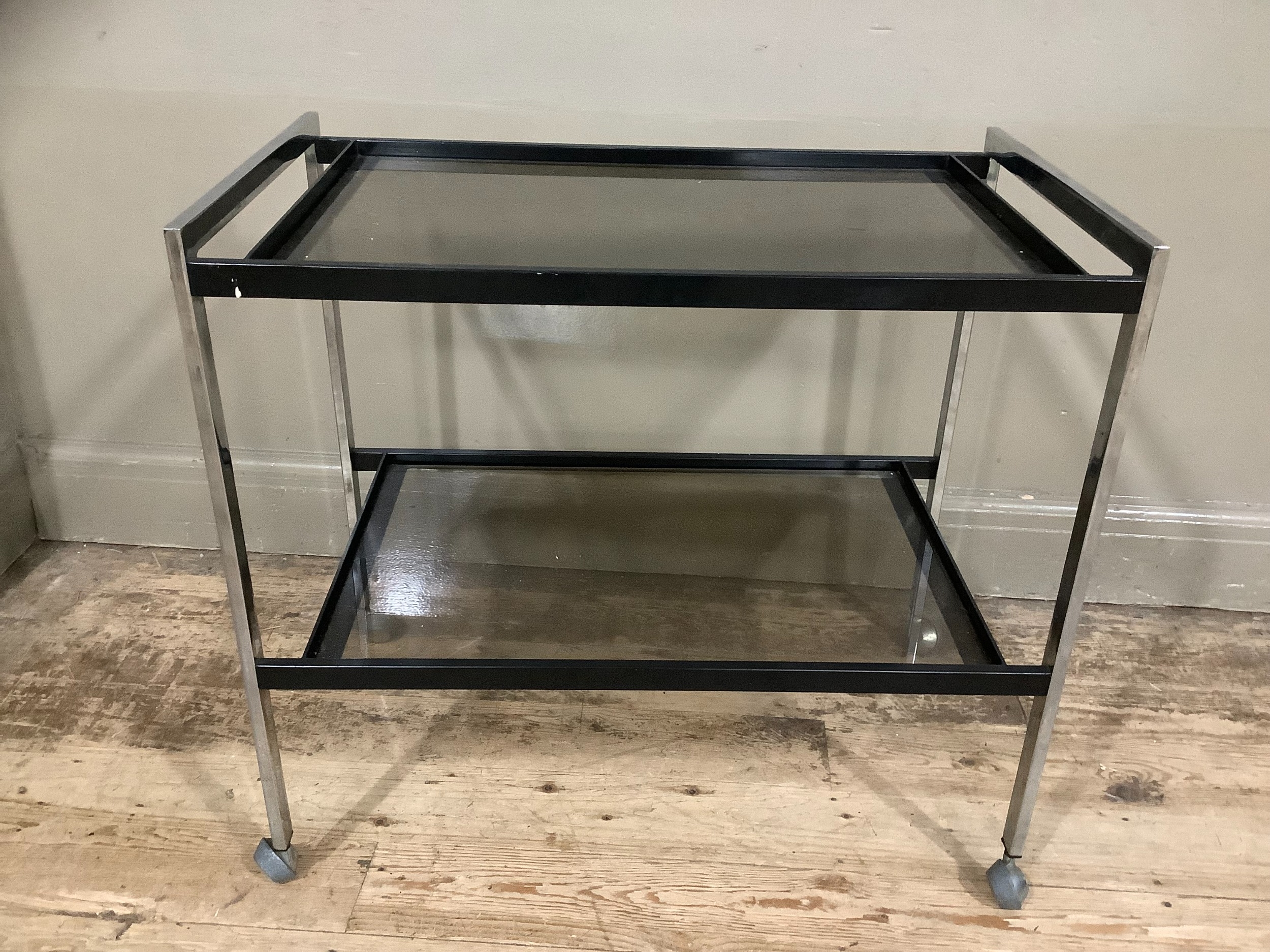 Two tier chrome and smoked glass drinks trolley on castors