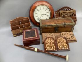 A collection of pierced letter racks, carved and pierced bookends, an inlaid bookend from Sorrento