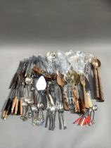 A suite of cutlery by Community for twelve together with other flatware including fondue forks,