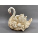 A large pottery model of a swan as a jardiniere 34.5cm high