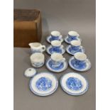 A 19th century blue and white miniature dolls tea set painted with scenes from Cinderella,