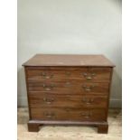 A mahogany bachelor's chest of four graduated drawers and on bracket feet, 92cm wide, 82cm high