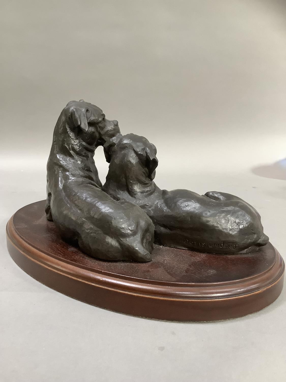 A bronze effect group of two boxer dogs on an oval plinth, 30cm wide x 15cm high - Image 5 of 7