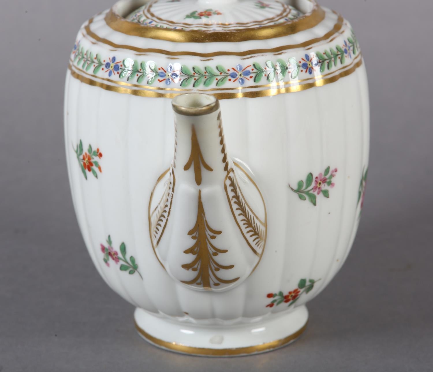 An 18th century teapot, the lid having an acorn gilt finial, the fluted body of barrel shape painted - Image 8 of 9