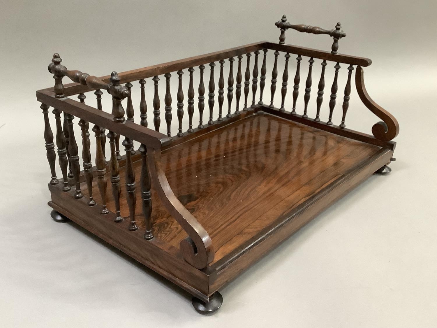 A 19th Century rosewood book trough with three quarter spindle gallery and carry handle on - Image 2 of 4