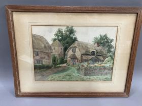 Phillip Kilner, Thatched cottages and garden, watercolour, signed to lower right, 25cm x 35cm