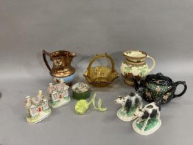 19th century ceramics comprising two creamers formed as cows, two Staffordshire money boxes formed