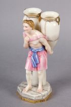 A Royal Worcester figure of a classical male water carrier carrying two amphora vases on his back,