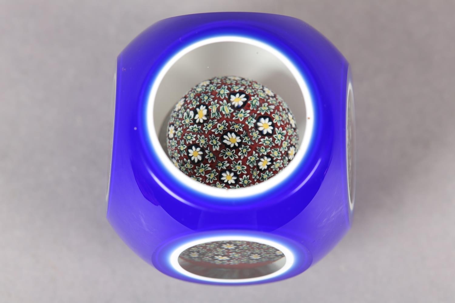A glass Murano double overlay cobalt blue and white Millefiori paperweight, c1950, the white, - Image 3 of 4