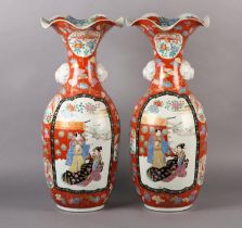 A Pair of Japanese Kutani vases, with flared frilled rims, having twin handles formed as white