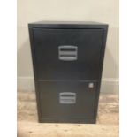 A black two drawer metal filing cabinet