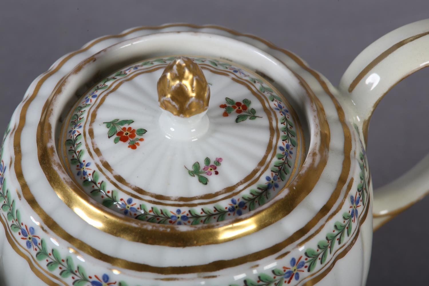 An 18th century teapot, the lid having an acorn gilt finial, the fluted body of barrel shape painted - Image 5 of 9