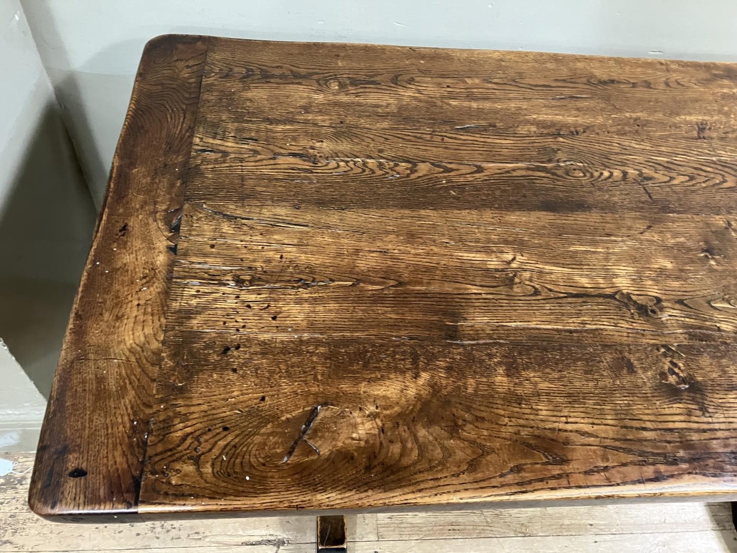 An oak refectory dining table on shaped standards and platform stretcher, 150cm x 74cm - Image 3 of 3