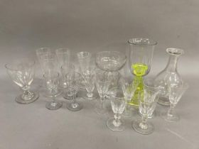A selection of Victorian glass ware including flutes, ports, rummer, pedestal sweet meat dish,