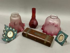 Two Victorian cranberry tinted and opaque glass light shades together with a cranberry lustre