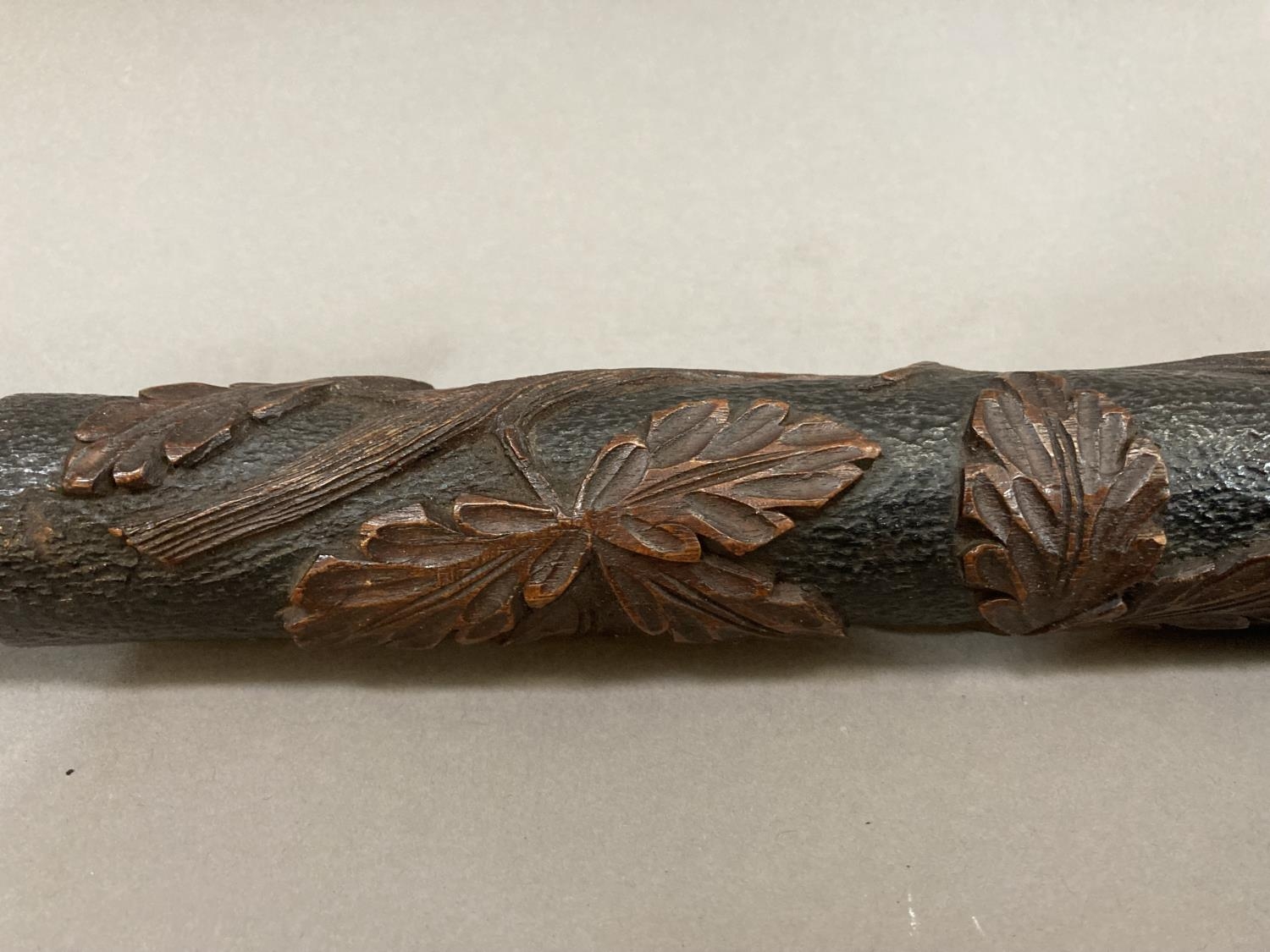 A large 19th Century Black Forest pipe, the bowl and stem carved with deer in a forest with tree and - Image 4 of 4