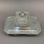 An Edward VII silver plate desk standish, rectangular with clipped corners, egg and dart rims, pen