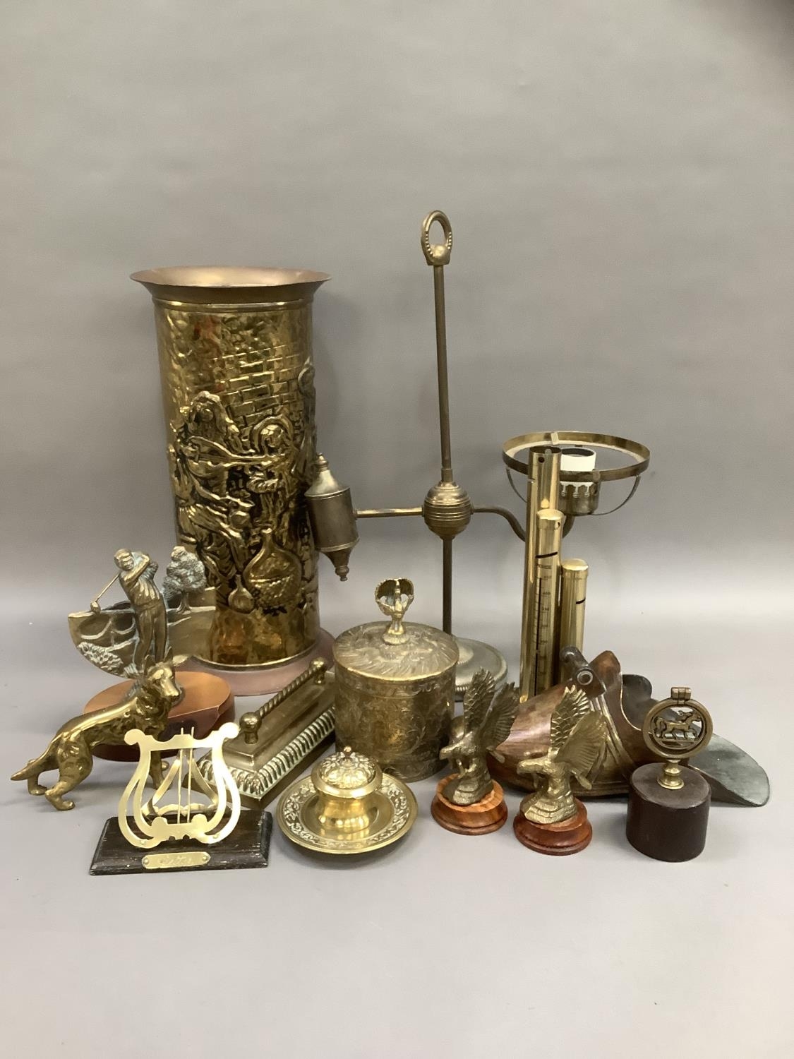 Brass ware including a Victorian inkwell, hearth ornaments, brass lyre-shaped letter holder, an