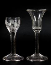 An 18th century wine glass, c1780, the ogee bowl etched with flower and leaves, on plain stem, domed