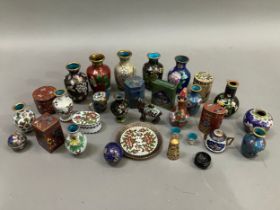 A collection of miniature cloisonné trinkets, vases, boxes, thimble, camel, beaker etc