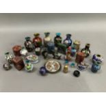 A collection of miniature cloisonné trinkets, vases, boxes, thimble, camel, beaker etc